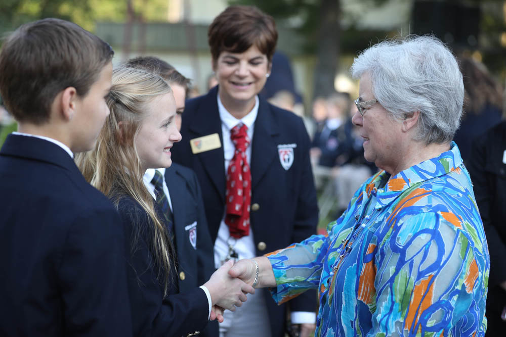 LEST WE FORGET
College of the Ozarks students shake the hand of Col. Karen Hobson, whose sister Angela Reed Kyte died in the World Trade Center towers.